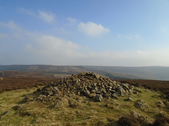 Live Moor monument after remedial work. Some loose stones have been left around the centre of the mound to protect the bare ground on the top until the vegetation can re-establish itself. Copyright Solstice Heritage.