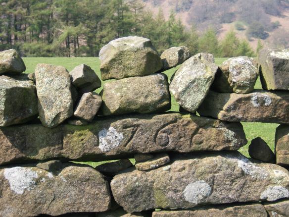 Close up of drystone wall with engraved date - copyright NYMNPA